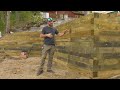 How to Build A TIMBER Retaining Wall [What's Behind the Wall?]