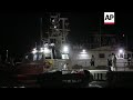 Six bodies from migrant shipwreck brought to port in Calabria, Italy