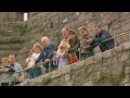 North Wales: Caernarfon Castle - Rick Steves’ Europe Travel Guide - Travel Bite