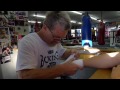 Boxing Trainer Freddie Roach wraps Nicholas Robinson's hands (Boxing)