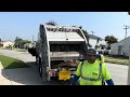 Nasa Services Peterbilt 320 McNeilus Rear Loader Garbage Truck Eating a Mattress