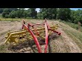 Raking Hay - New Holland Rollabar 56