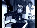 2Pac ft Shock G on the piano.