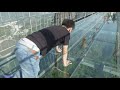 Raw: Tourists Brave Glass-Bottom Bridge