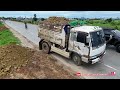 Wonderful landfill action skills 5ton dump trucks loading soil with Mitsubishi BD2f dozer push soil