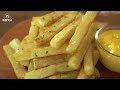 Fried Potatoes and Cheese Sauce :: How to Make Crispy French Fries