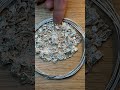 melting a silver bar into grain for making sterling wire.