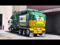 Waste Management Autocar ACX Amrep HX-450 Front Loader Collecting A Commercial Dumpster