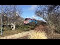 A outbound inbound metra heads past glenview