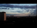 Passing rainclouds at dusk