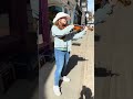 Teen violinist busker plays Country Roads by John Denver