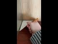 Peeling ugly fake wood contact paper from an antique hoosier cabinet