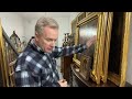 The ochre sides of antique gilt picture frames