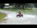 3 year old on 4 wheeler doing brodies