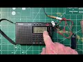 Does grounding affect shortwave reception on the Tecsun PL 330?