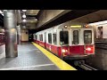 MBTA Green, Blue, Orange, and Red Line trains pulling into stations