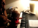 Everett learning to play the piano