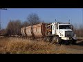 CN Hi-Rail Boom Truck Pulling Wisconsin Central Rail Flats and Gondolas