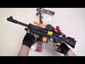 Collection of toy gun unboxing review tests, Spider Man submachine gun, AK47 assault rifle