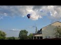 Hot air balloon almost hits our house.