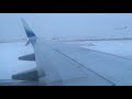 Alaska Airlines Flight 56 snow landing at Chicago O'Hare Runway 9L